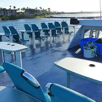 a blue boat sitting on top of a table